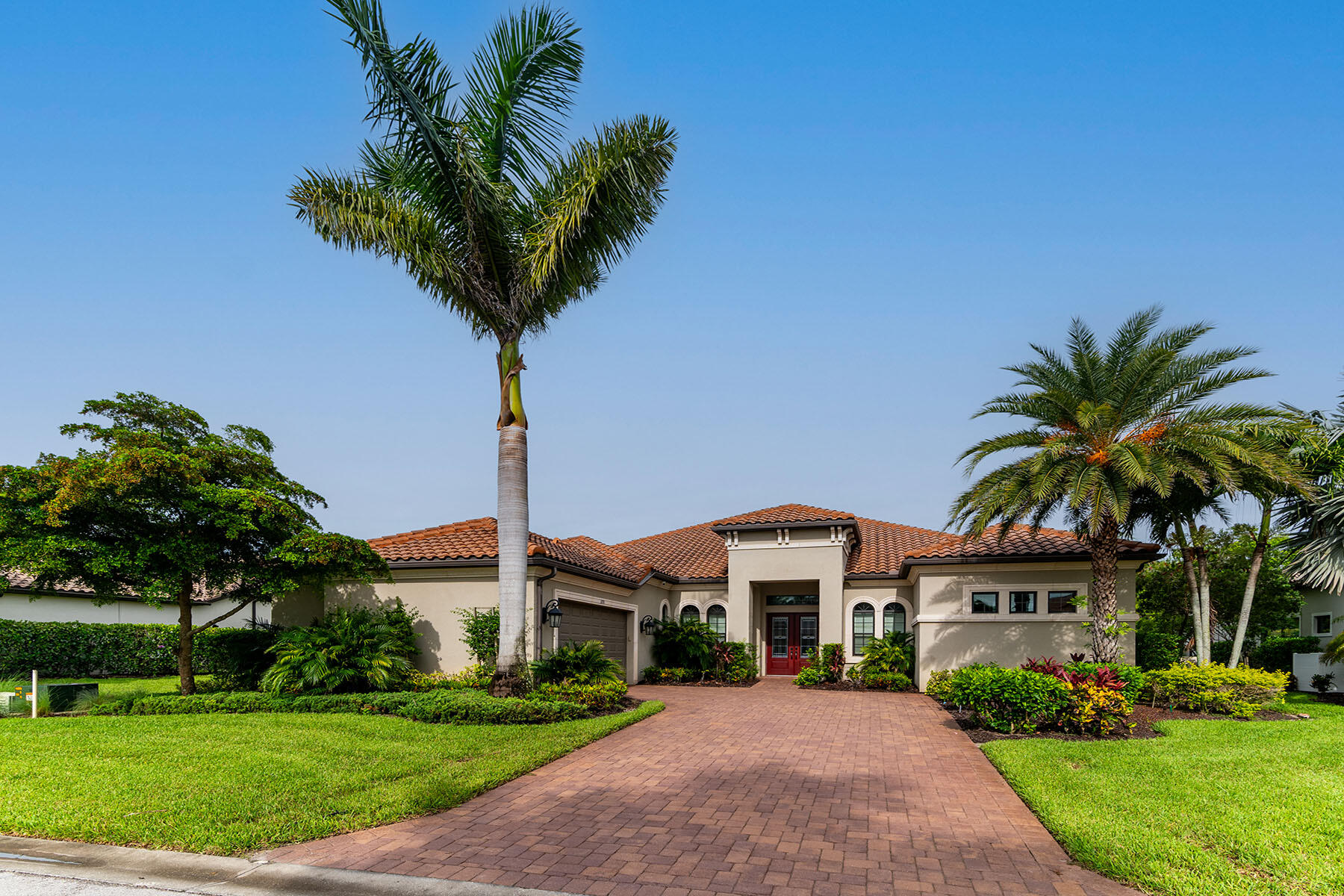 3193 Olympia Lane Naples, FL 34114 - Photo 2 of 50 a front view of house with yard and green space