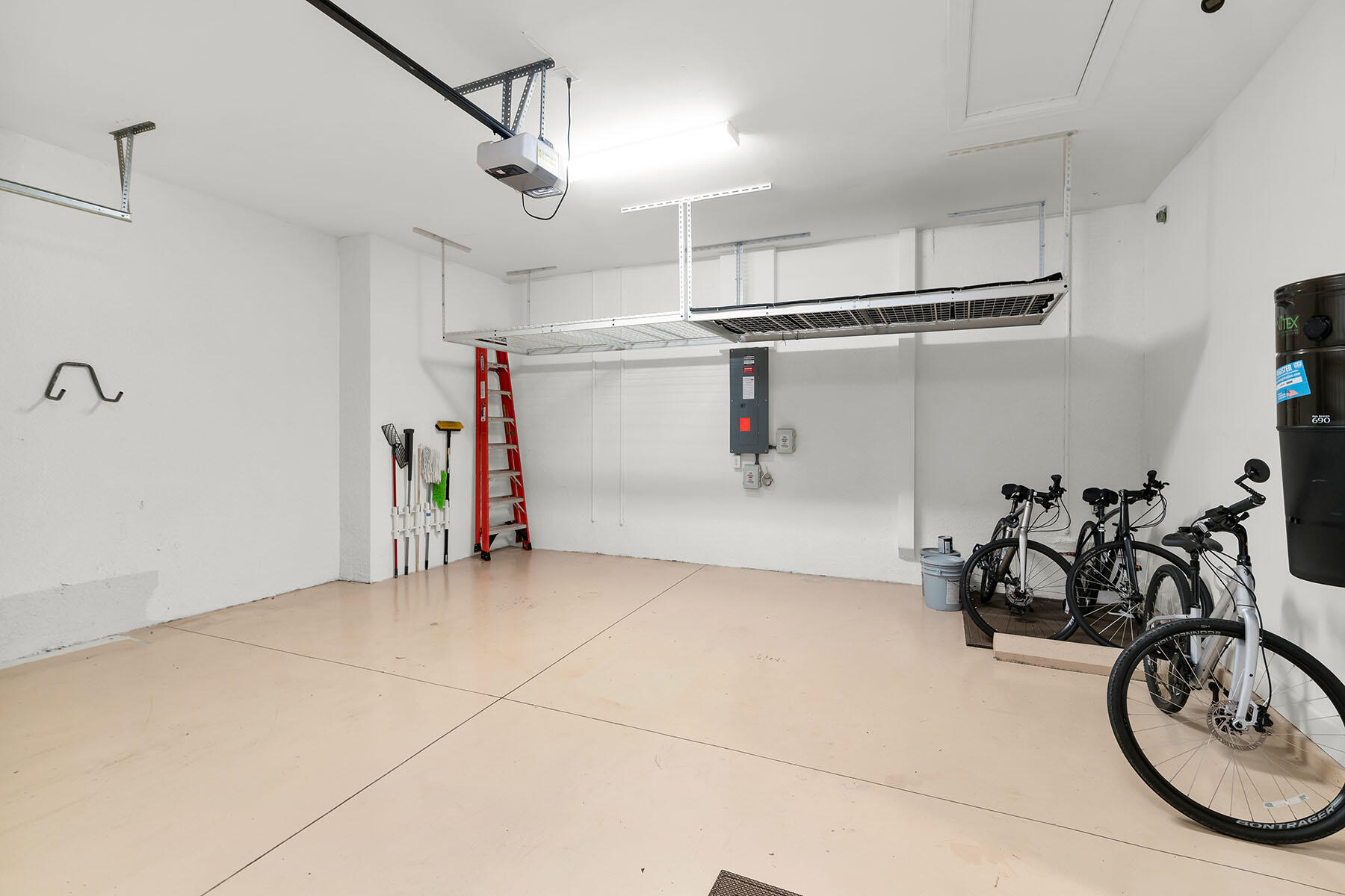 3193 Olympia Lane Naples, FL 34114 - Photo 26 of 50 a view of a storage & utility room with two washing machine