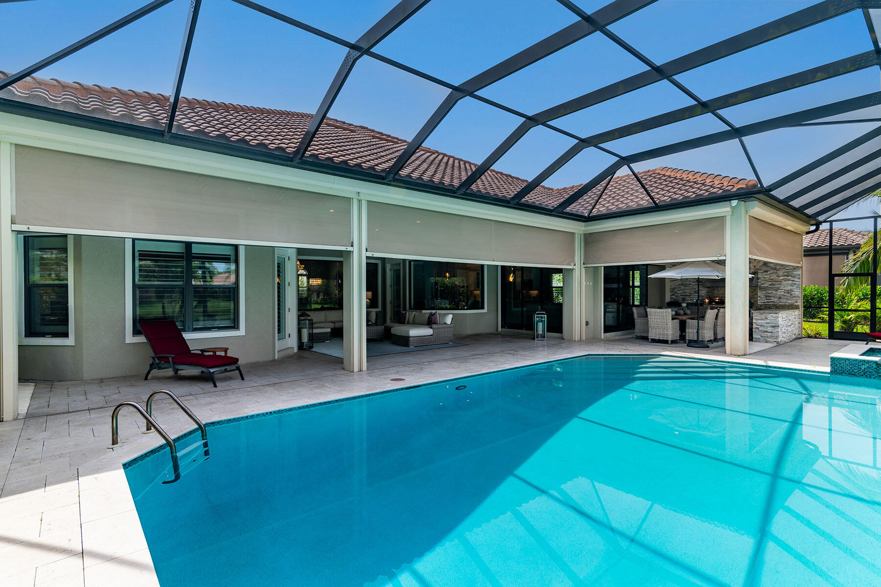 3193 Olympia Lane Naples, FL 34114 - Photo 36 of 50 a view of a dinning room with furniture and floor to ceiling window