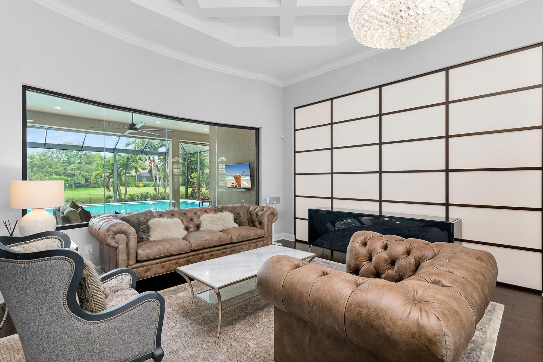3193 Olympia Lane Naples, FL 34114 - Photo 5 of 50 a living room with furniture and a large window