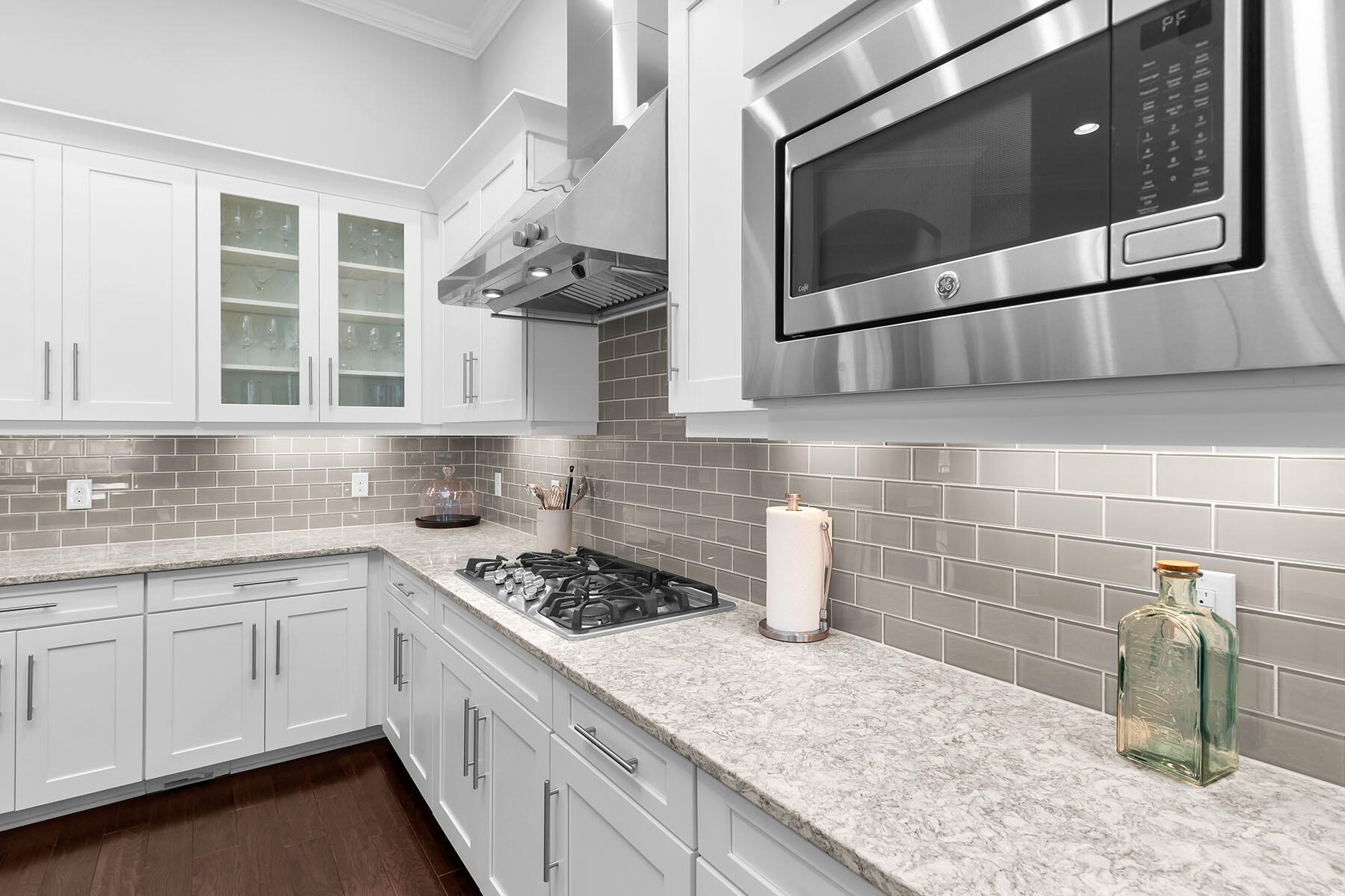 3193 Olympia Lane Naples, FL 34114 - Photo 9 of 50 a kitchen with stainless steel appliances kitchen island granite countertop a sink and a stove