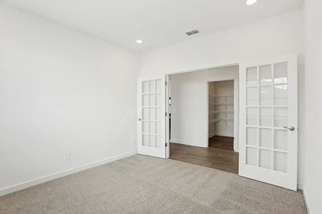 an empty room with closet