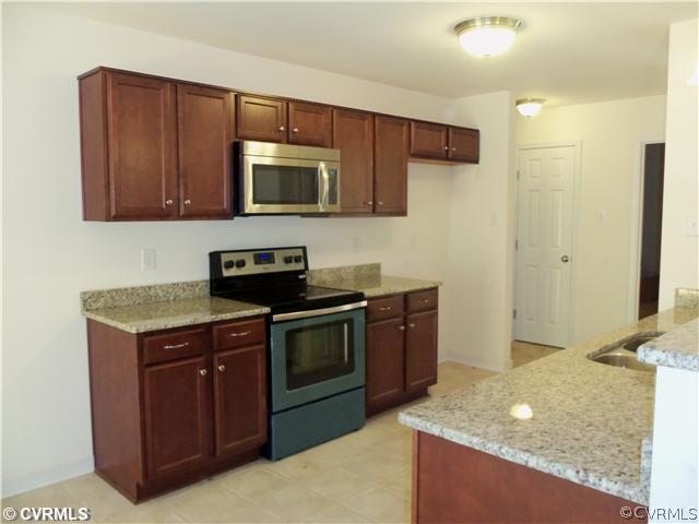 3964 Lost Mill Road Powhatan, VA 23139 - Photo 4 of 24 Kitchen - Actual kitchen - granite counter tops an