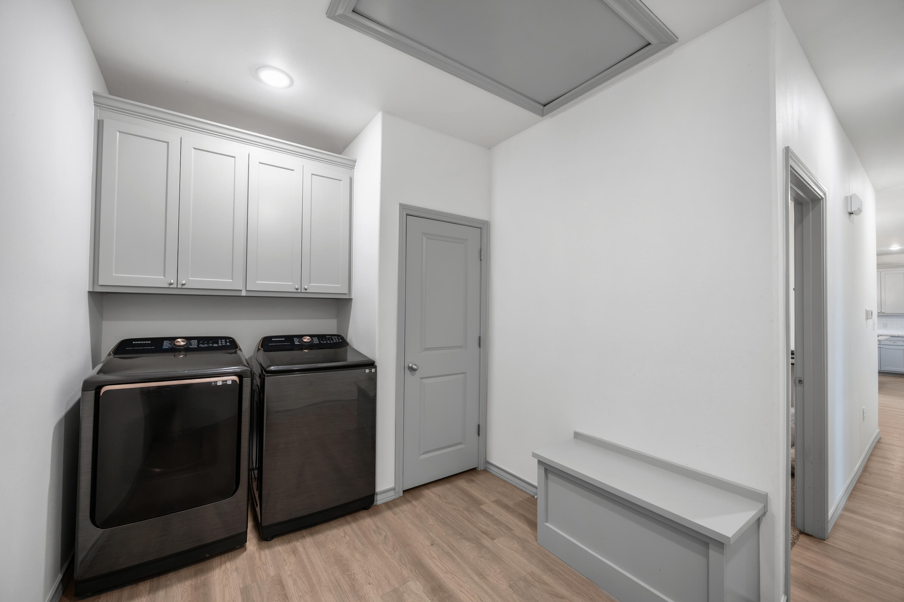 1389 Redhead Road Wilson, TX 79381 - Photo 23 of 41 Utility Room & Welcome home drop Bench