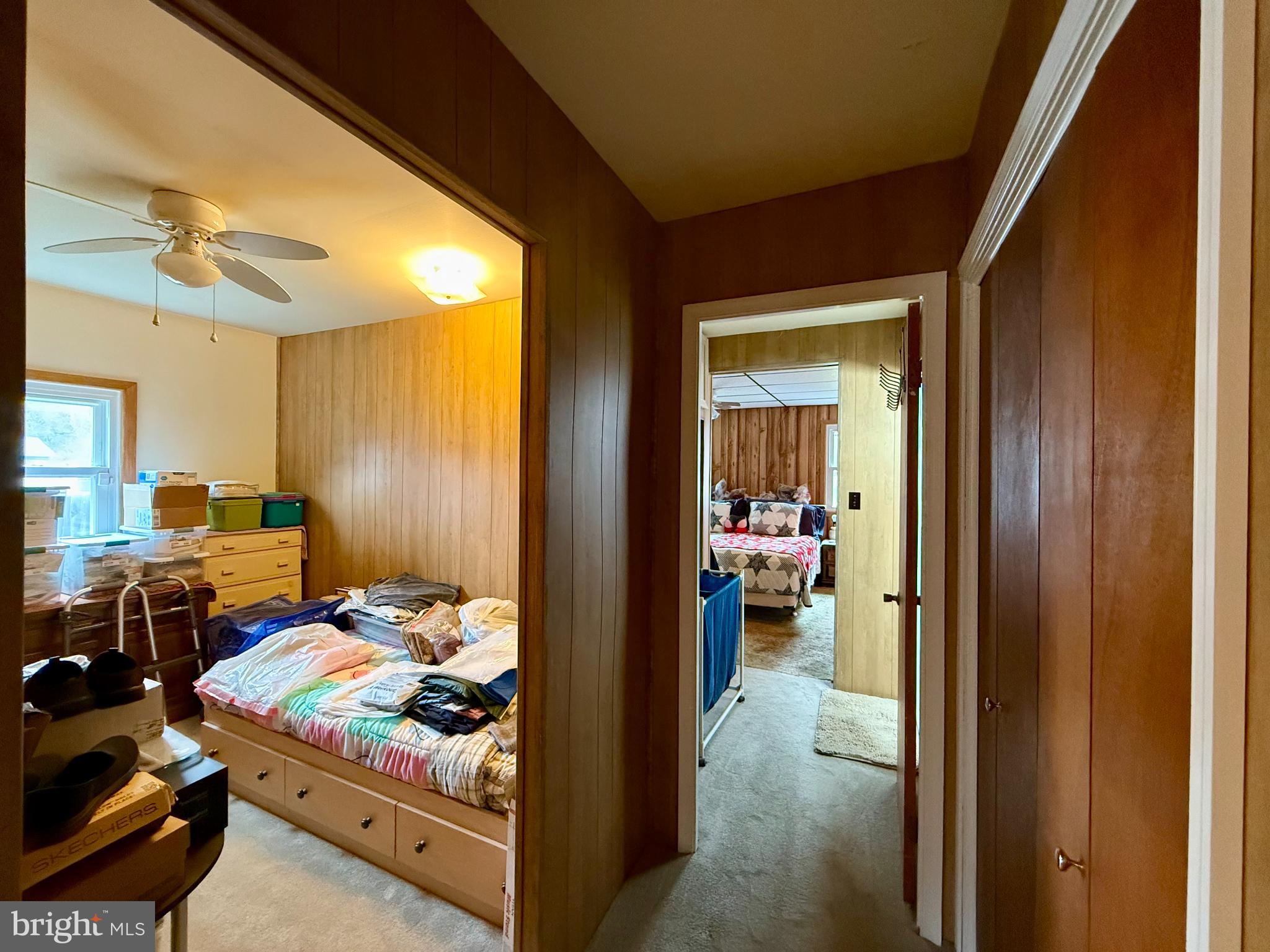 29866 Jefferson Road Mechanicsville, MD 20659 - Photo 28 of 43 a view of a hallway and a livingroom with furniture