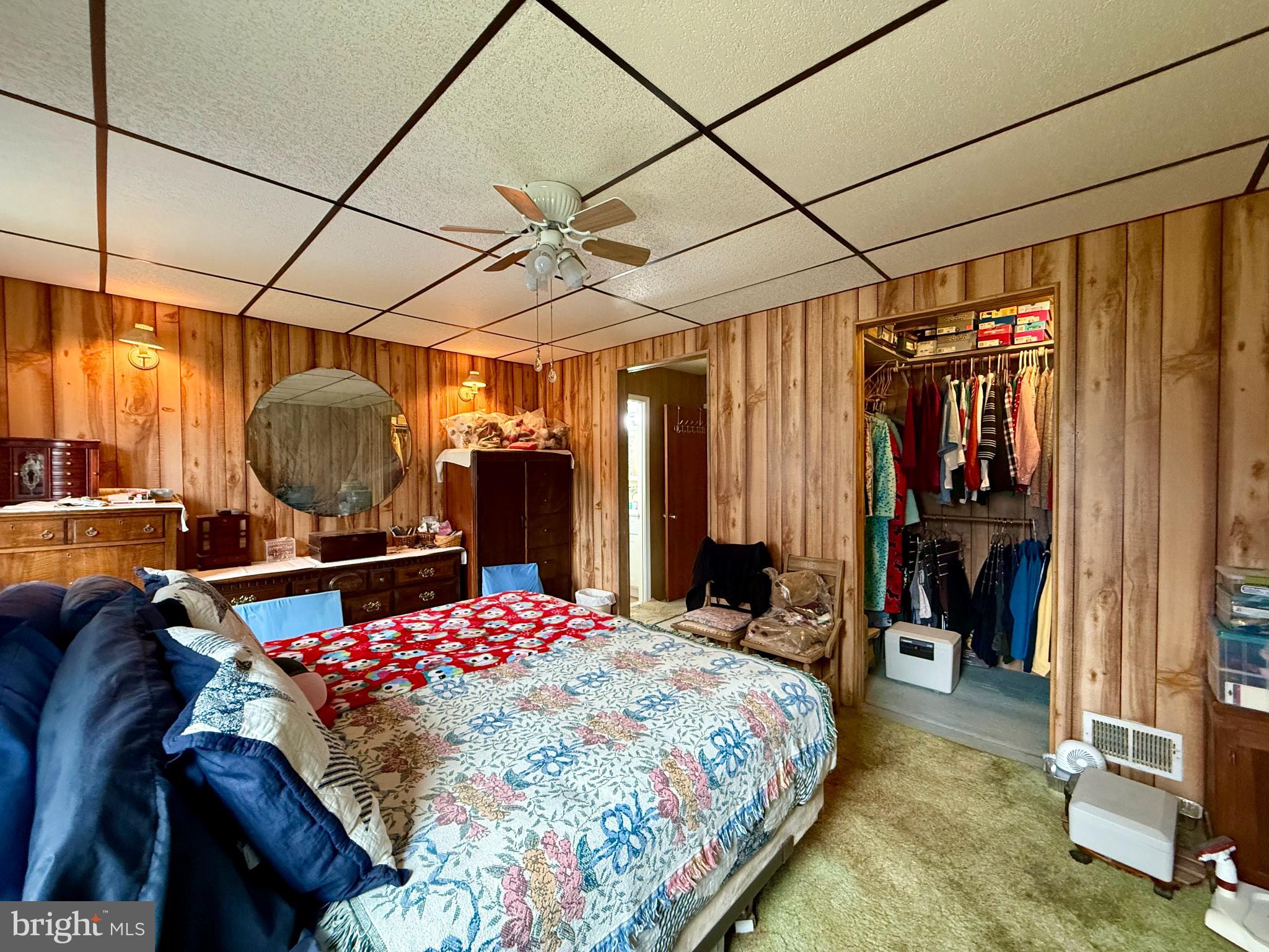 29866 Jefferson Road Mechanicsville, MD 20659 - Photo 34 of 43 a bedroom with a bed a standing desk and a window