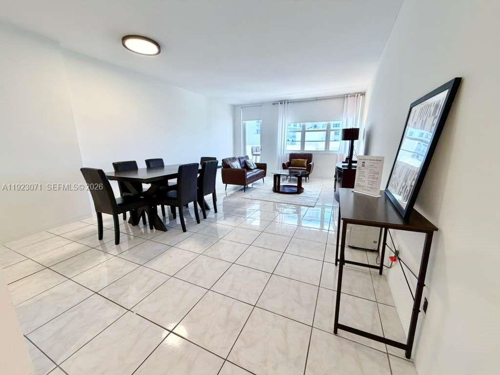 100 Lincoln Road, Unit 541 Miami Beach, FL 33139 - Photo 7 of 17 a view of a dining room with furniture