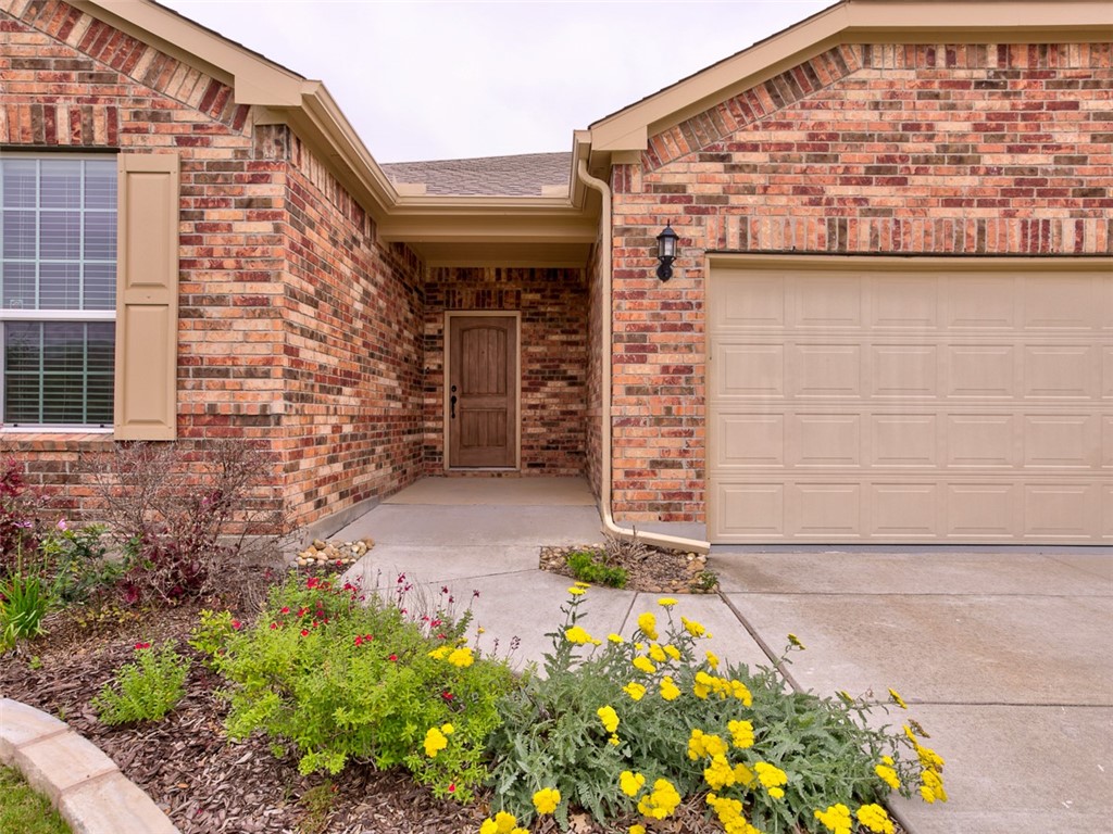 613 Kite Ridge Street Georgetown, TX 78633 - Photo 1 of 1 Full brick all four sides - lovely entry and full gutters on home