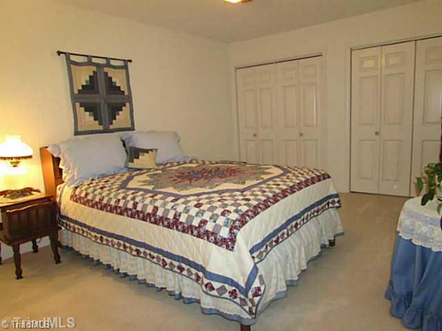 604 Ragsdale Road Jamestown, NC 27282 - Photo 13 of 16 2nd Bedroom. No lack of closet space here!