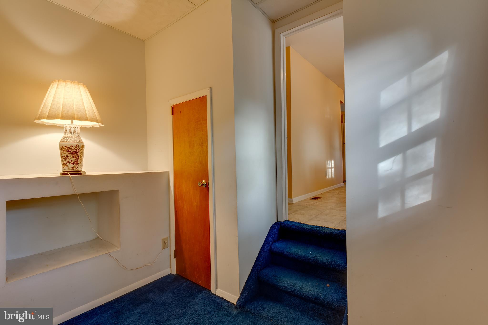 225 Sunnybrook Road Barrington, NJ 08007 - Photo 22 of 26 a view of a hallway with wooden floor and staircase
