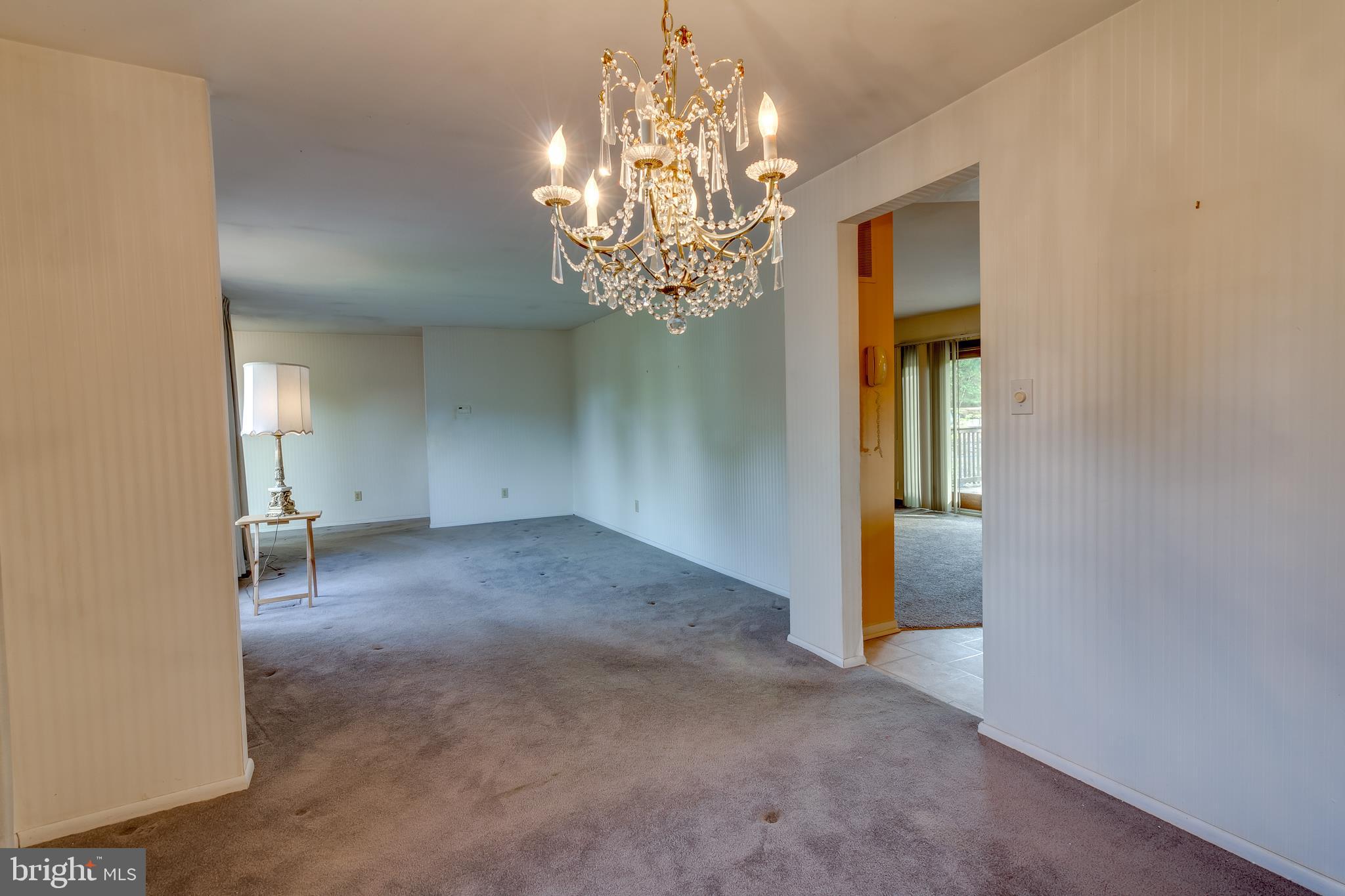 225 Sunnybrook Road Barrington, NJ 08007 - Photo 7 of 26 a view of a chandelier in big room and chandelier