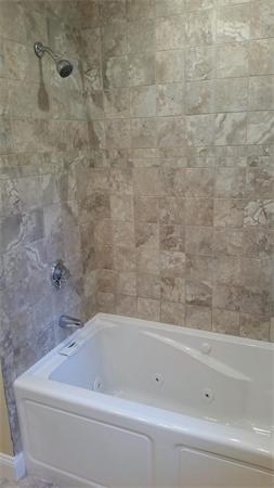 29 Stratford Road Natick, MA 01760 - Photo 6 of 7 a bathroom with a bathtub