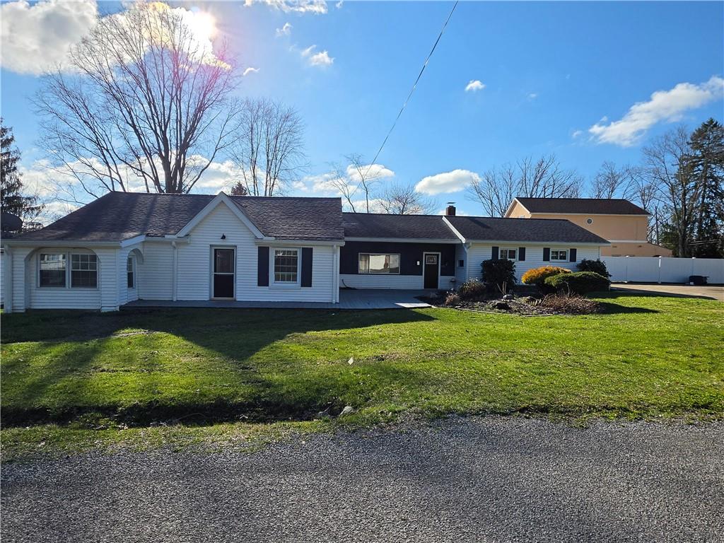 11753 Oakview Road Conneaut Lake, PA 16316 - Photo 34 of 34 a front view of a house with garden