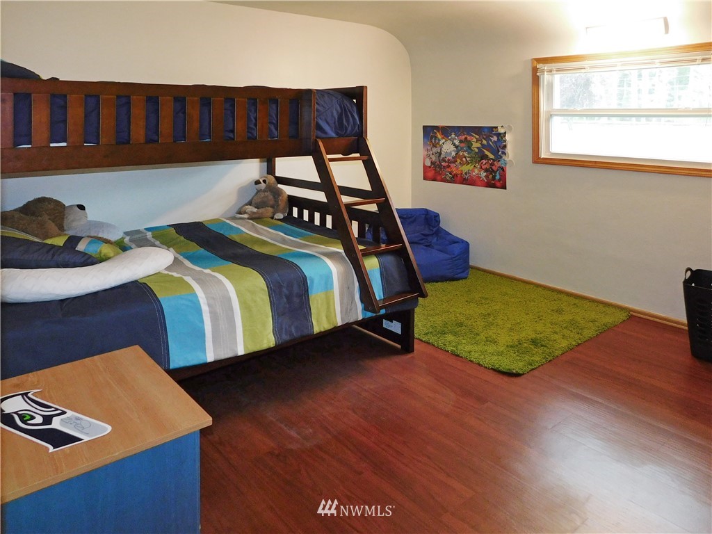 2902 Jackson Highway Chehalis, WA 98532 - Photo 14 of 32 a bedroom with a bed and a window