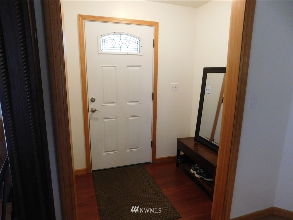 2902 Jackson Highway Chehalis, WA 98532 - Photo 3 of 32 a view of a hallway with a door in a room