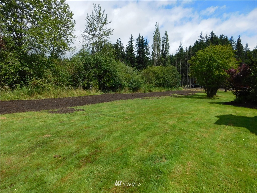 2902 Jackson Highway Chehalis, WA 98532 - Photo 28 of 32 a view of outdoor space with deck and yard
