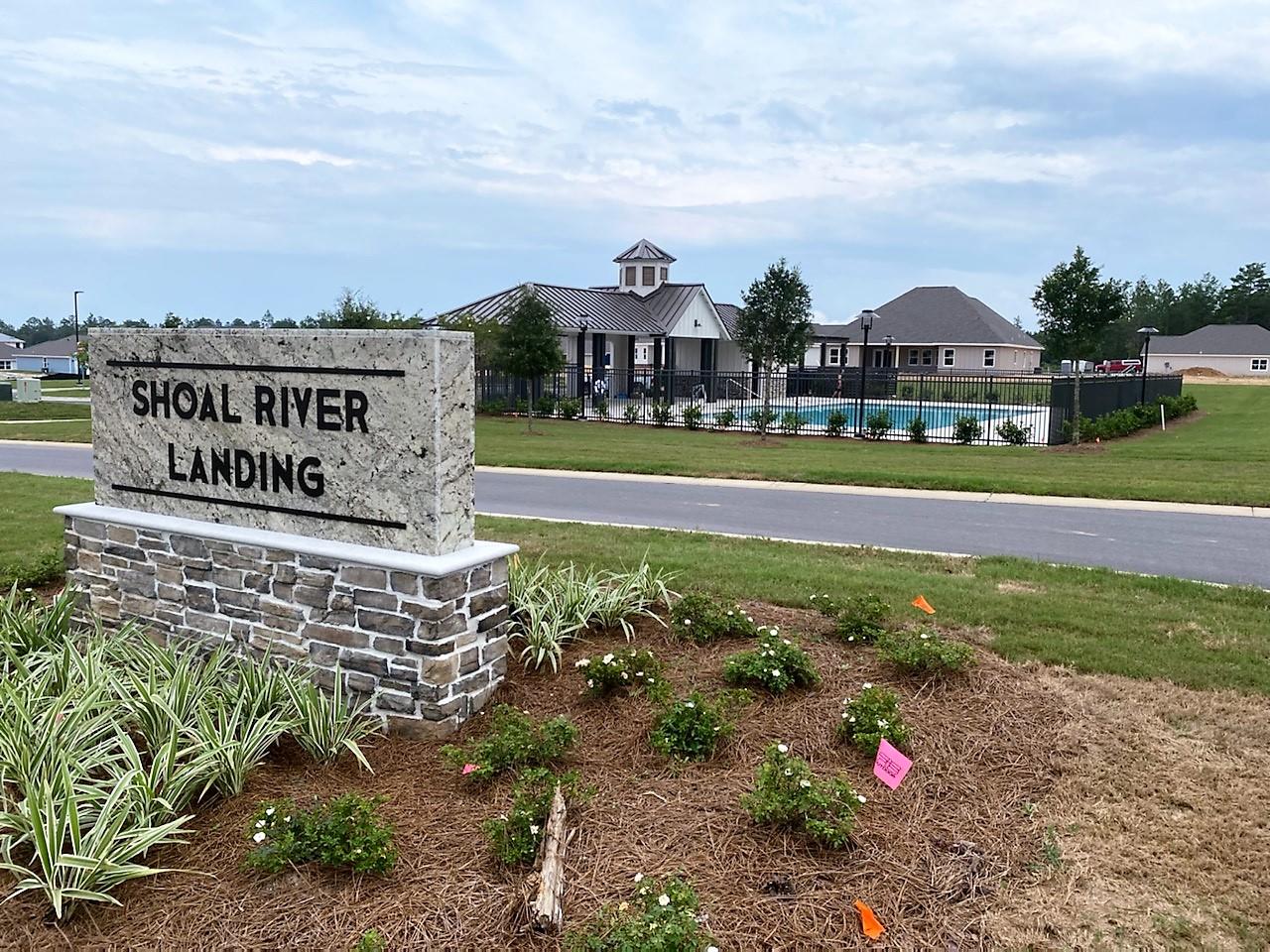 127 Hobson Avenue Crestview, FL 32539 - Photo 3 of 21 a view of a city with tall buildings in the background