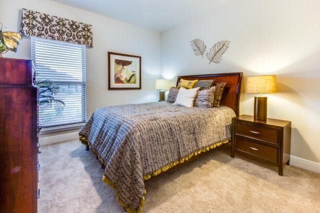 127 Hobson Avenue Crestview, FL 32539 - Photo 10 of 21 a bedroom with a bed and lamps