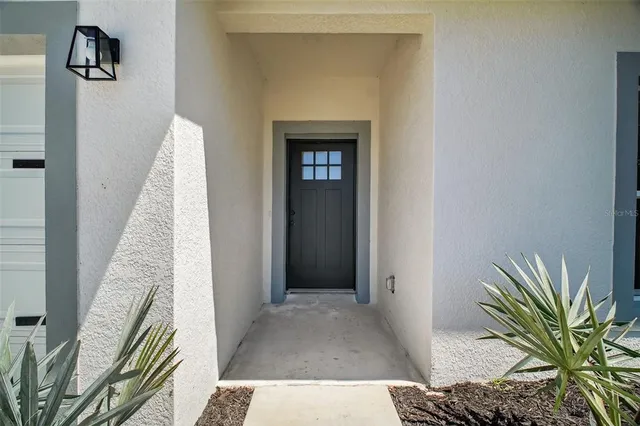 a view of an entryway with a rug