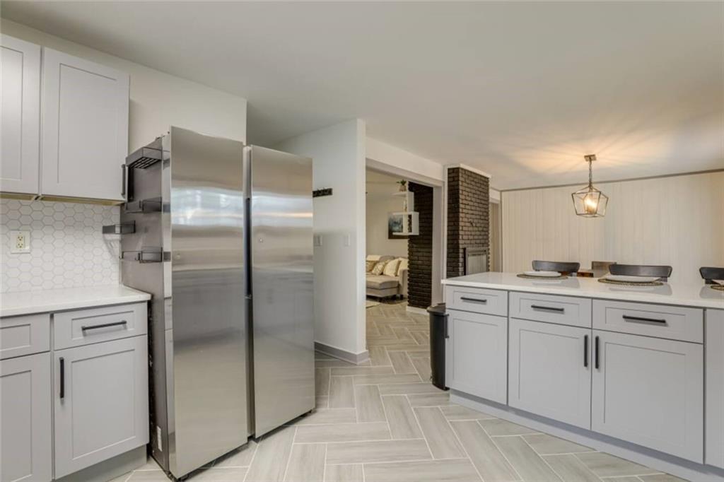 1944 Cindy Drive Decatur, GA 30032 - Photo 11 of 22 a kitchen with cabinets and stainless steel appliances