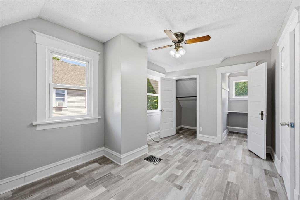 62 Kenyon Street Springfield, MA 01109 - Photo 18 of 26 a view of an empty room with a window