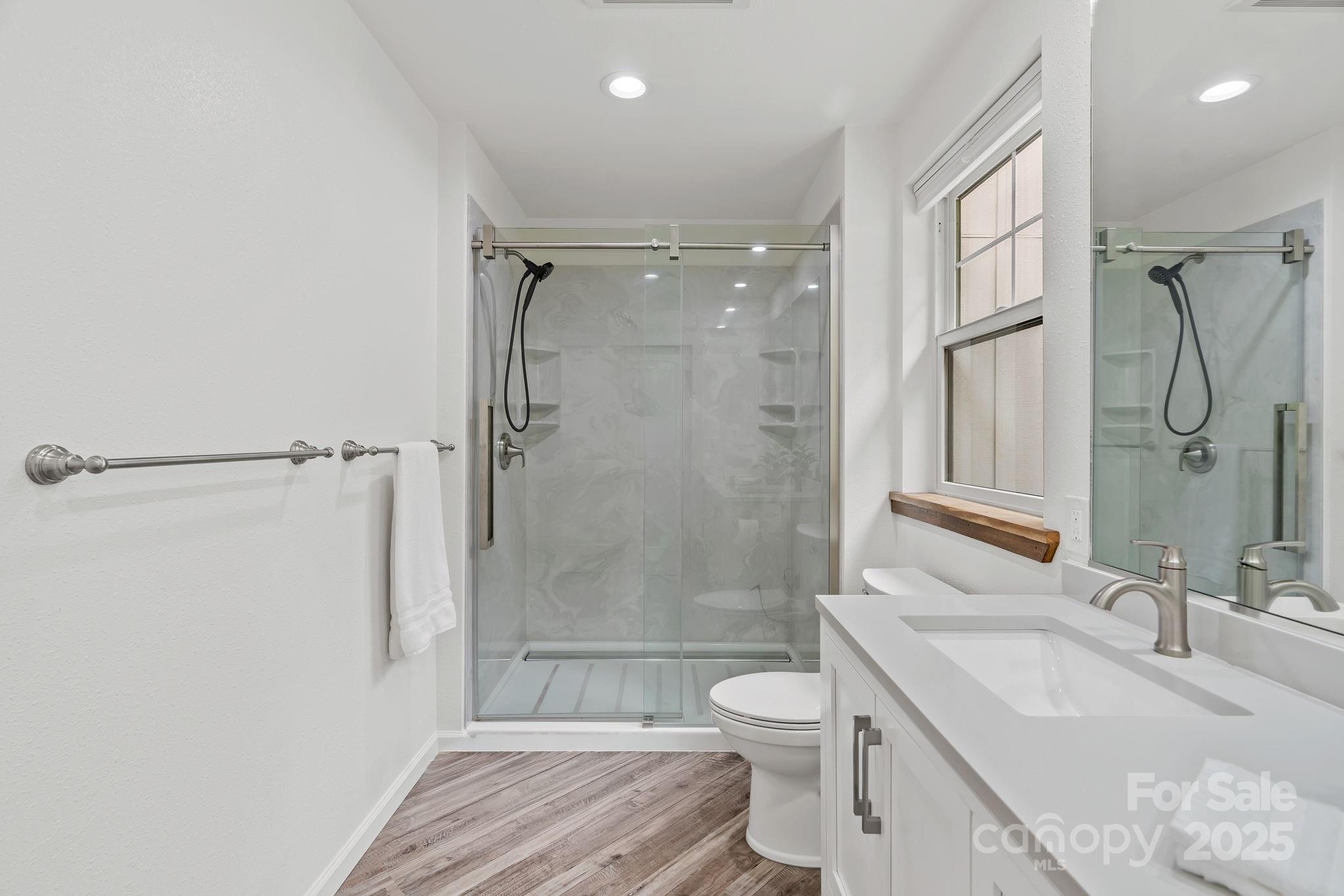 204 Mountain Spring Lane Canton, NC 28716 - Photo 26 of 45 a bathroom with a sink toilet tub and shower