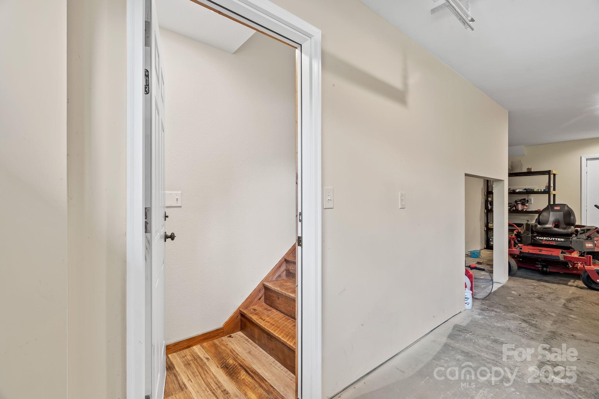 204 Mountain Spring Lane Canton, NC 28716 - Photo 33 of 45 a view of a livingroom with furniture and a hallway