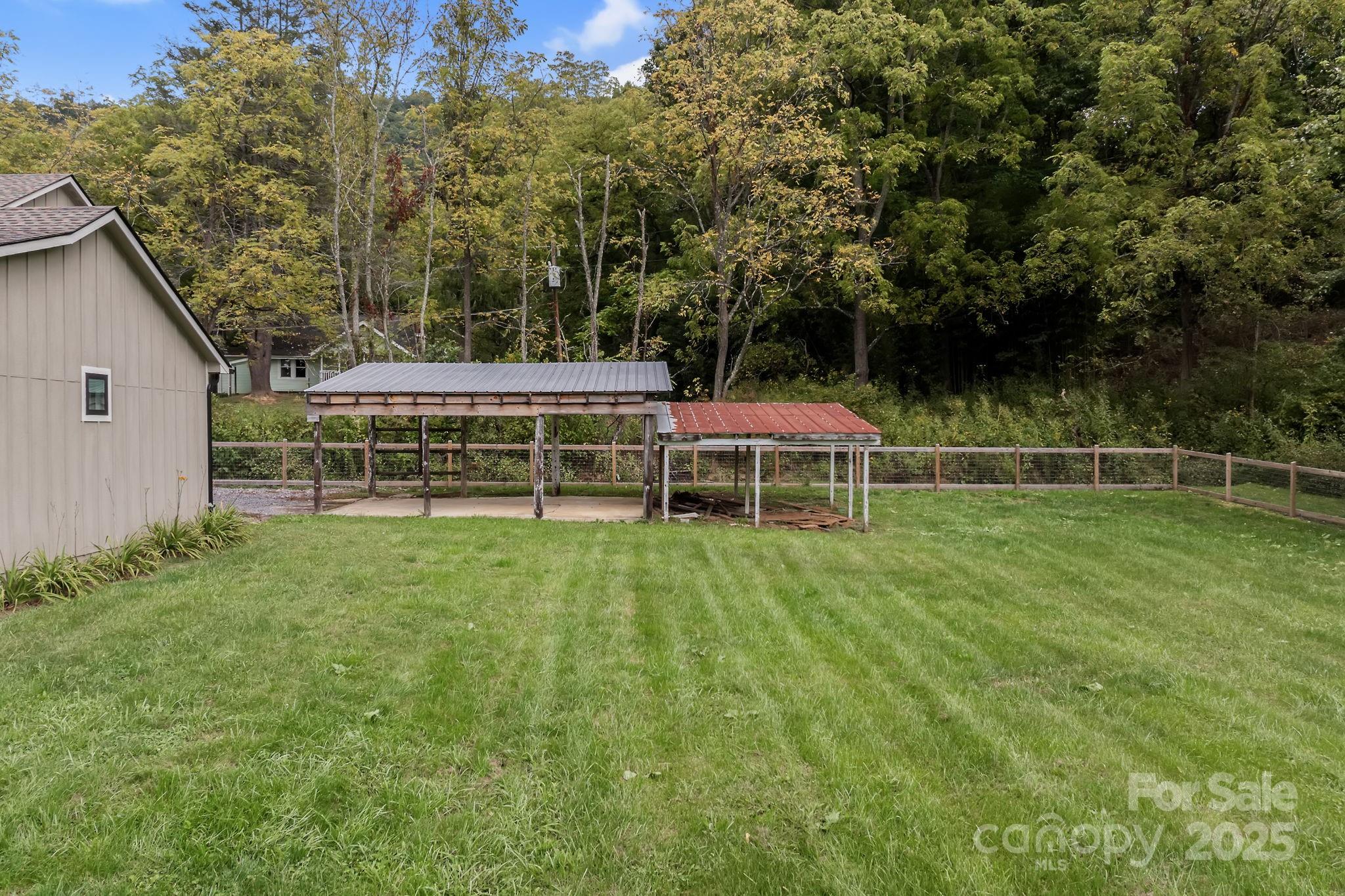 204 Mountain Spring Lane Canton, NC 28716 - Photo 41 of 45 a view of a house with backyard