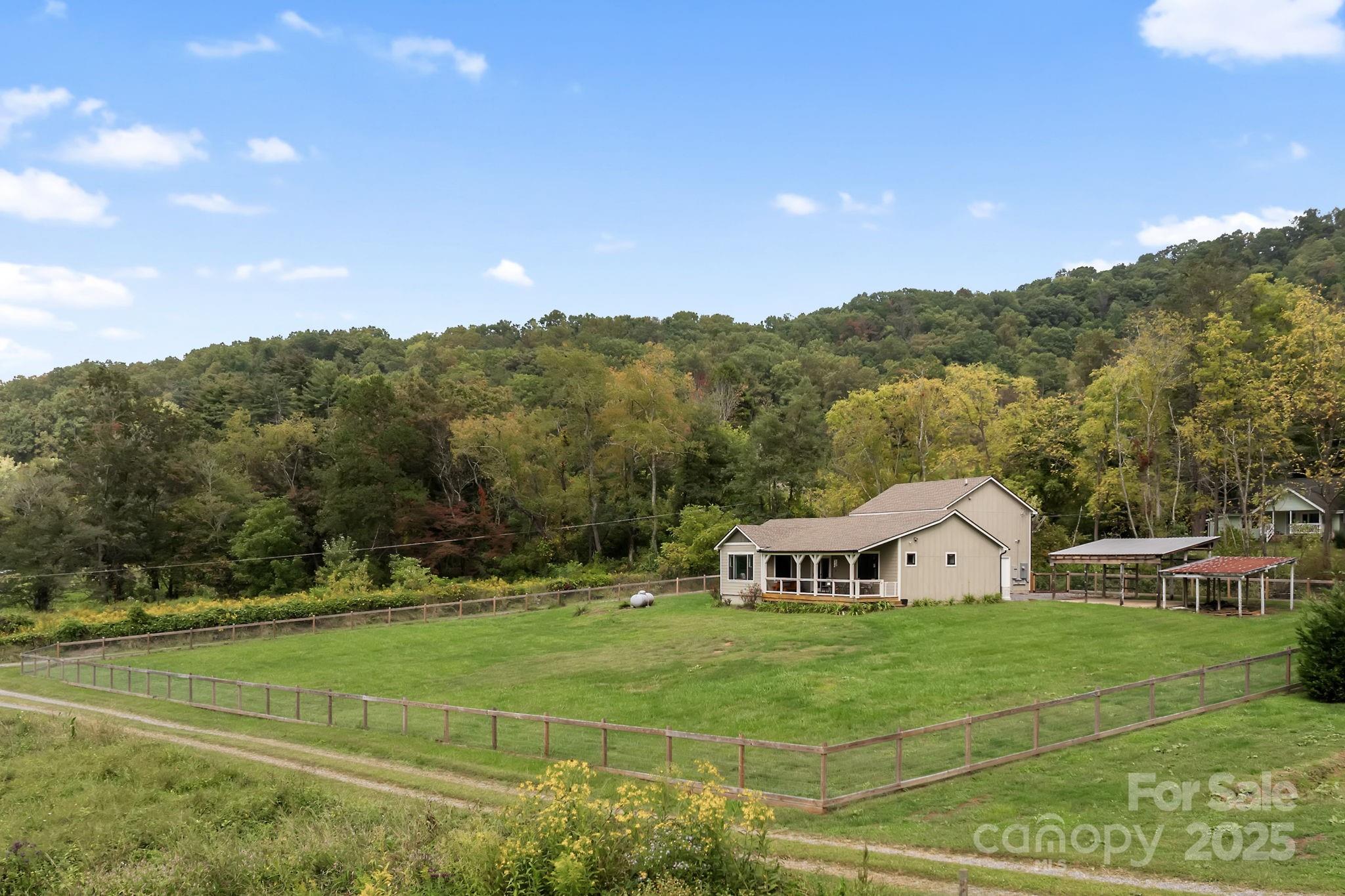 204 Mountain Spring Lane Canton, NC 28716 - Photo 44 of 45 a view of a house with a big yard
