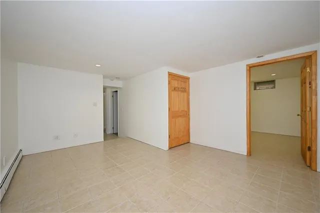 an empty room with closet area
