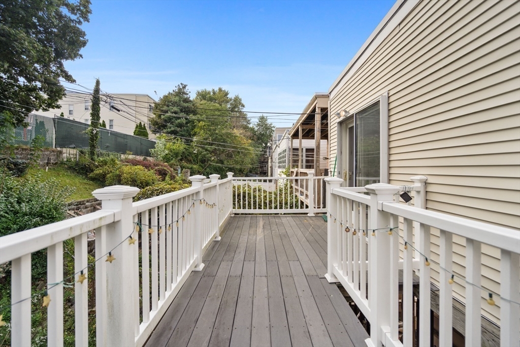 61 Wordsworth Street, Unit 2 Boston, MA 02128 - Photo 9 of 12 a view of a house with wooden floor