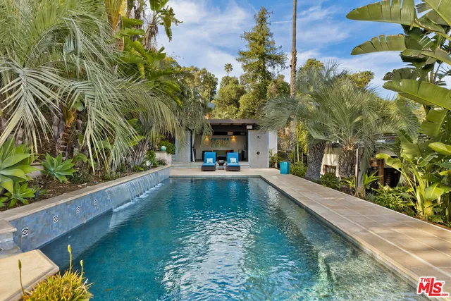 a view of a house with a swimming pool