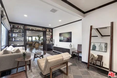 a bathroom with double vanity sink and a mirror
