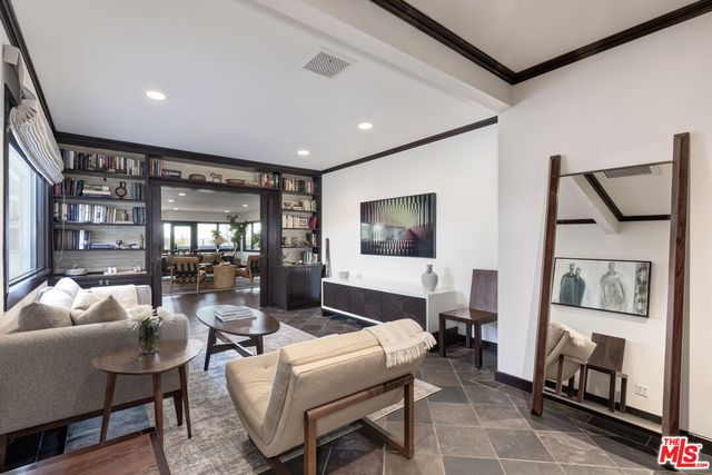 a bathroom with double vanity sink and a mirror