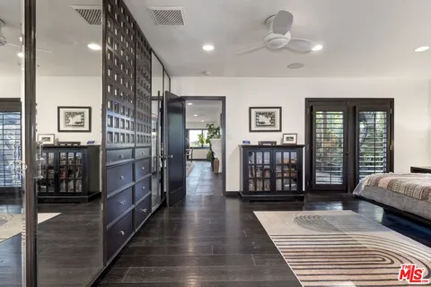 a view of living room with furniture and flat screen tv