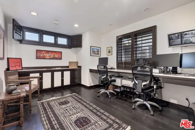 a view of a workspace with furniture