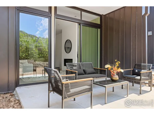 a view of balcony and wooden floor