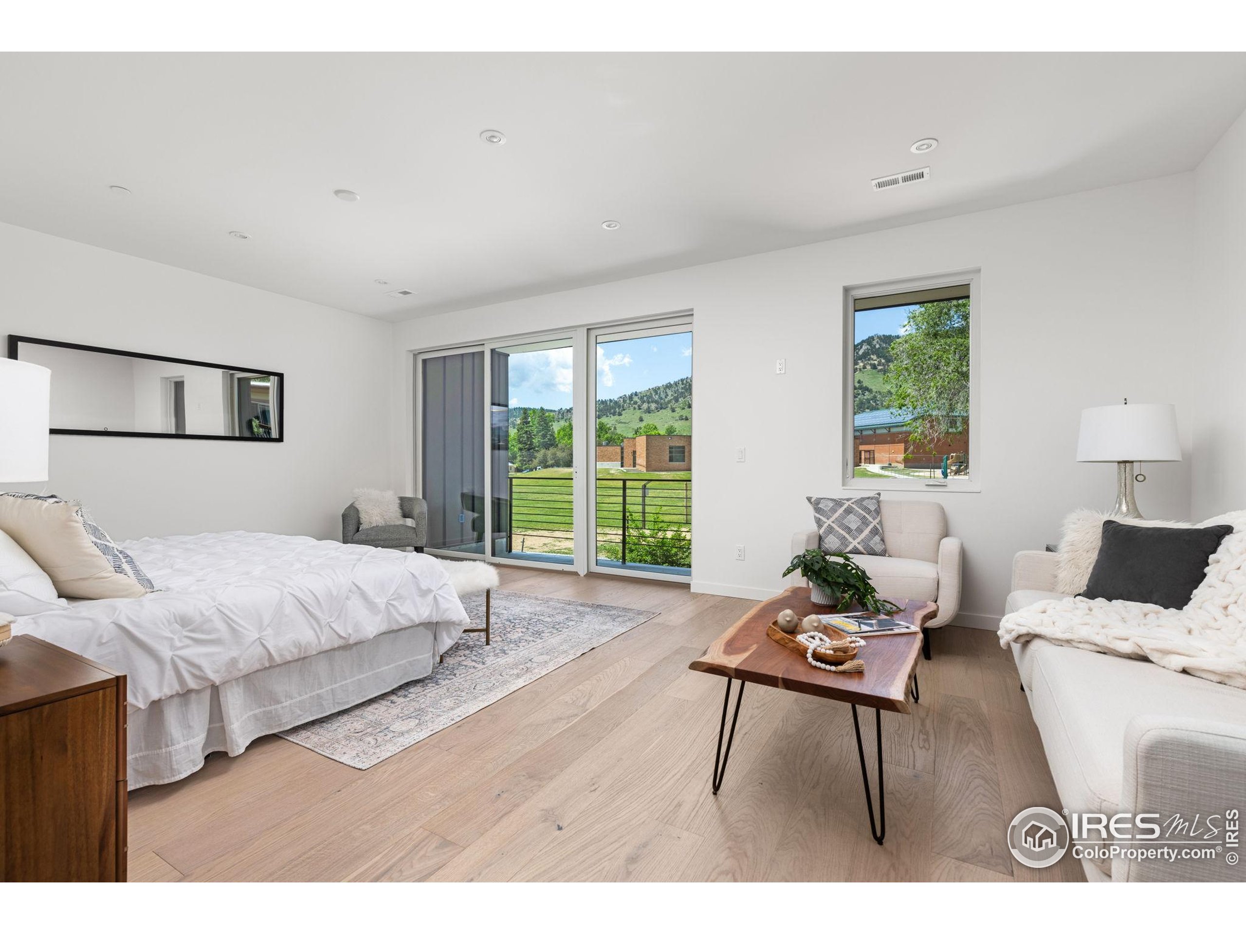 3315 Broadway Boulder, CO 80304 - Photo 17 of 42 a living room with furniture and a large window