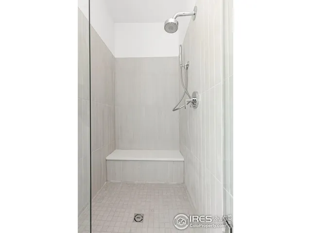 a bathroom with a sink vanity mirror and a toilet