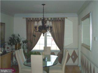 5 Sandstone Road Hightstown, NJ 08520 - Photo 2 of 5 a view of entryway and hall with wooden floor