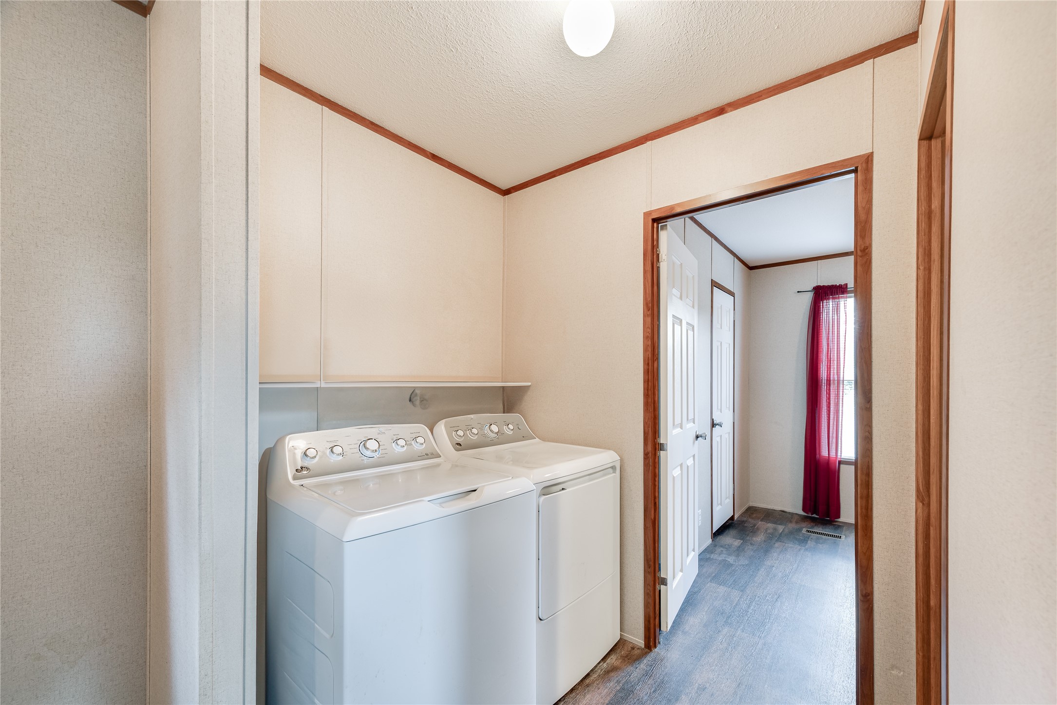 232 North Kerr Road Wharton, TX 77488 - Photo 14 of 37 a view of a storage & utility room with a washer dryer