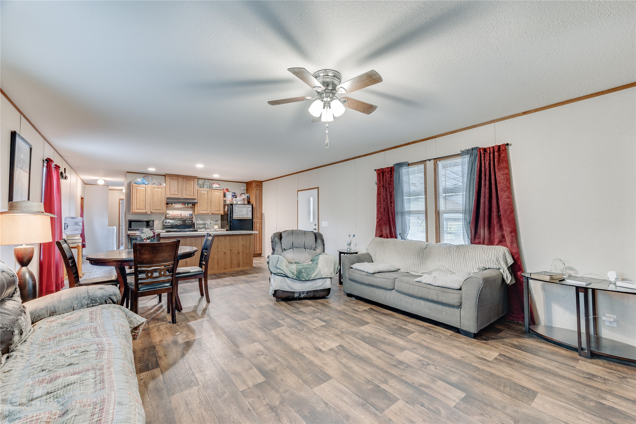 232 North Kerr Road Wharton, TX 77488 - Photo 7 of 37 a living room with furniture and a large window