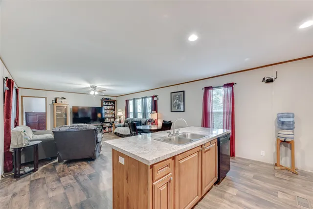 a view of living room with furniture and flat screen tv