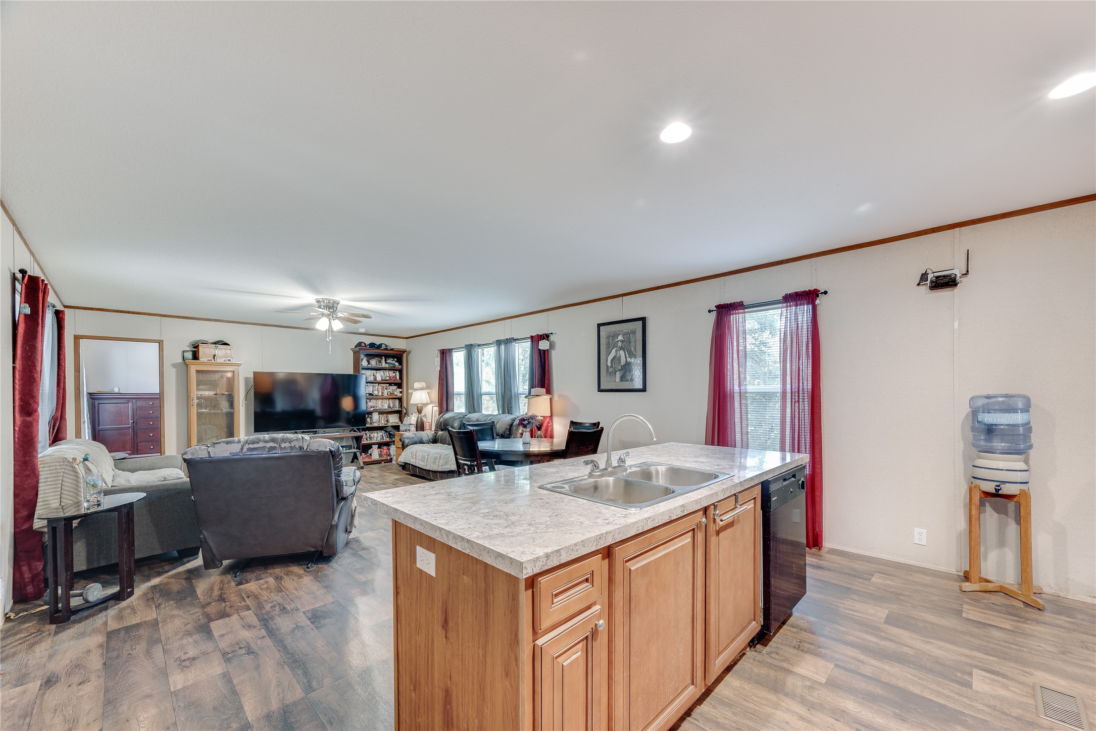 232 North Kerr Road Wharton, TX 77488 - Photo 10 of 37 a view of living room with furniture and flat screen tv