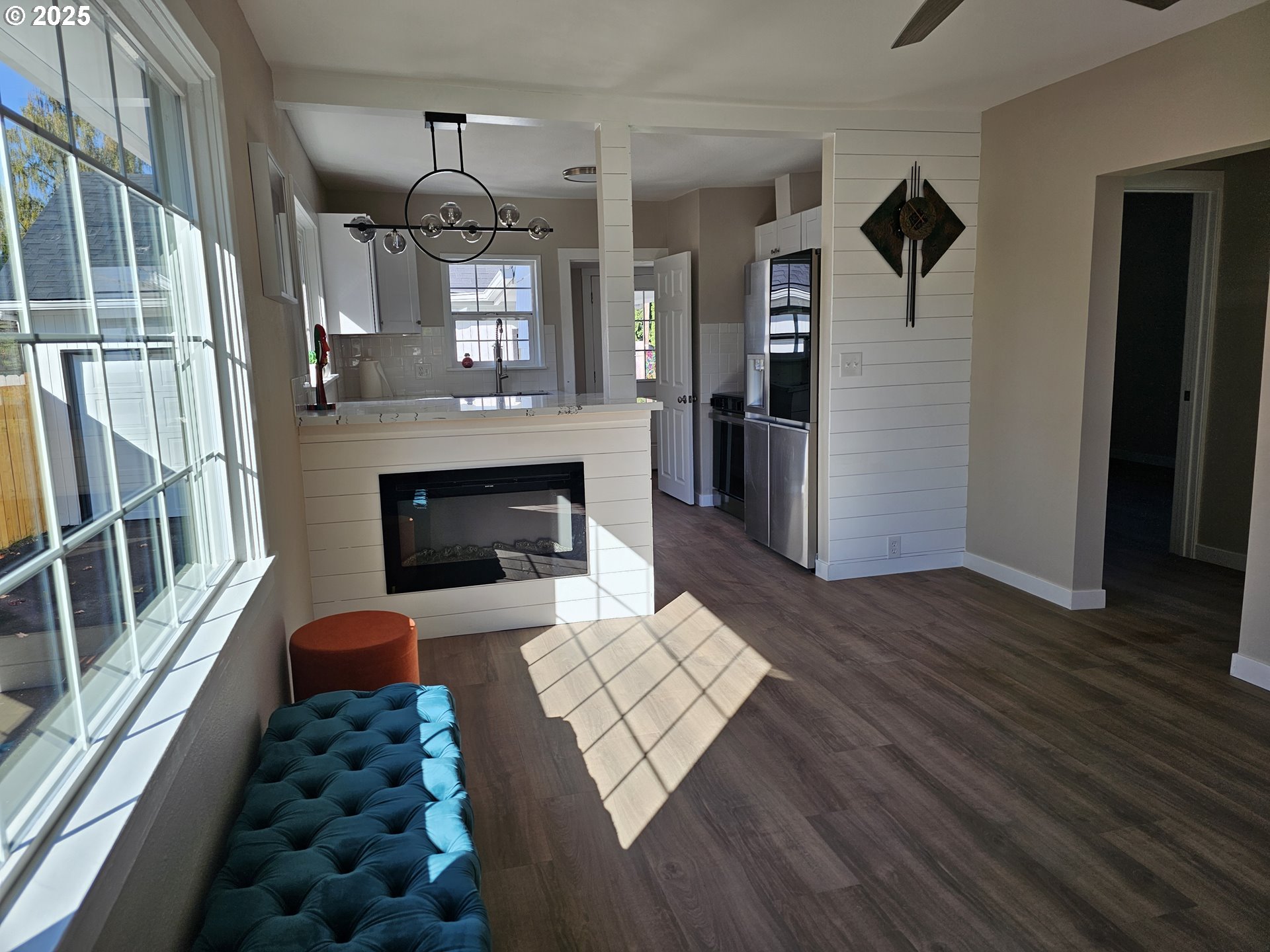 3128 Garfield Street Longview, WA 98632 - Photo 18 of 48 a living room with furniture fireplace and wooden floor