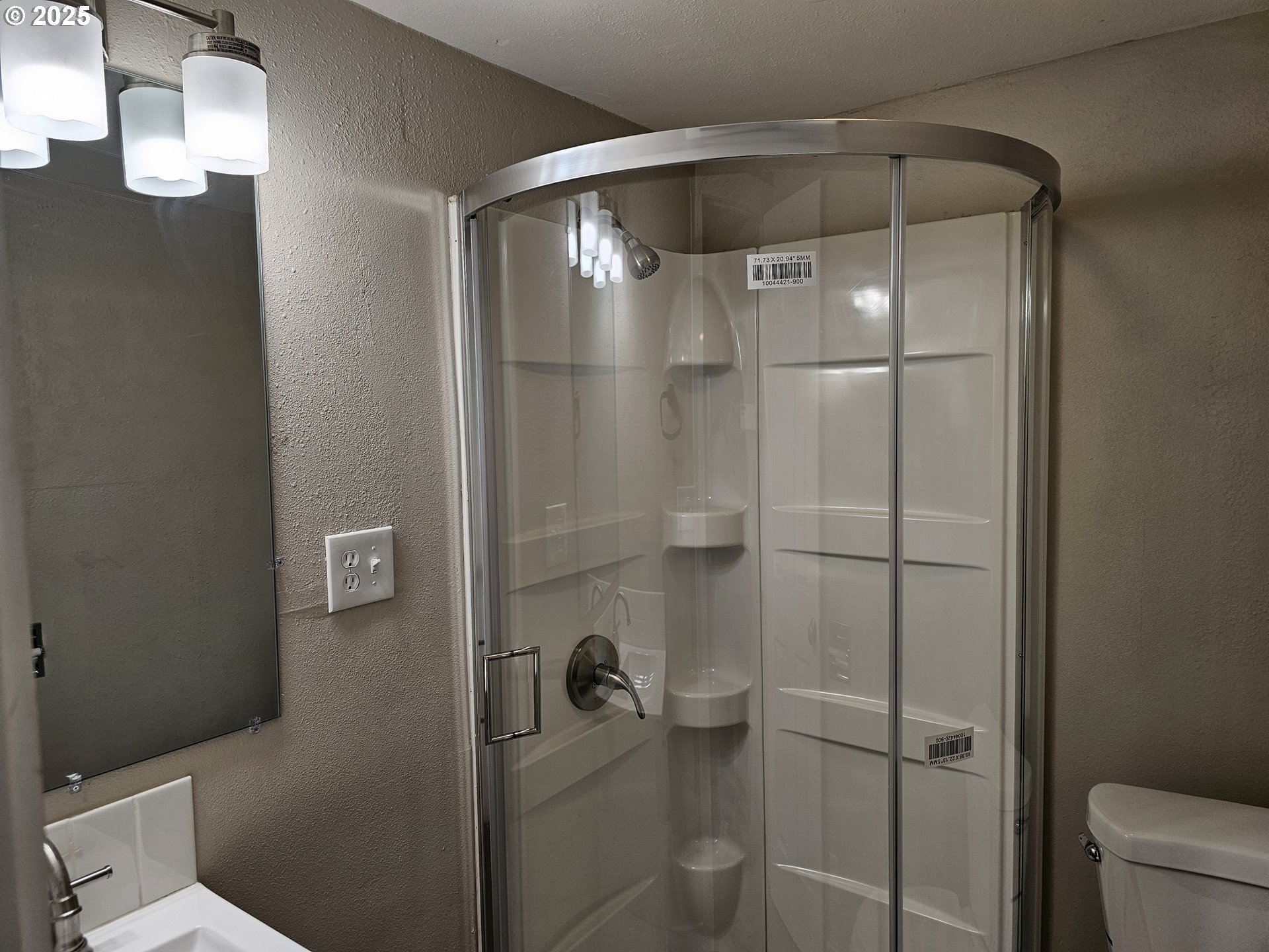 3128 Garfield Street Longview, WA 98632 - Photo 43 of 48 a bathroom with a shower and a toilet