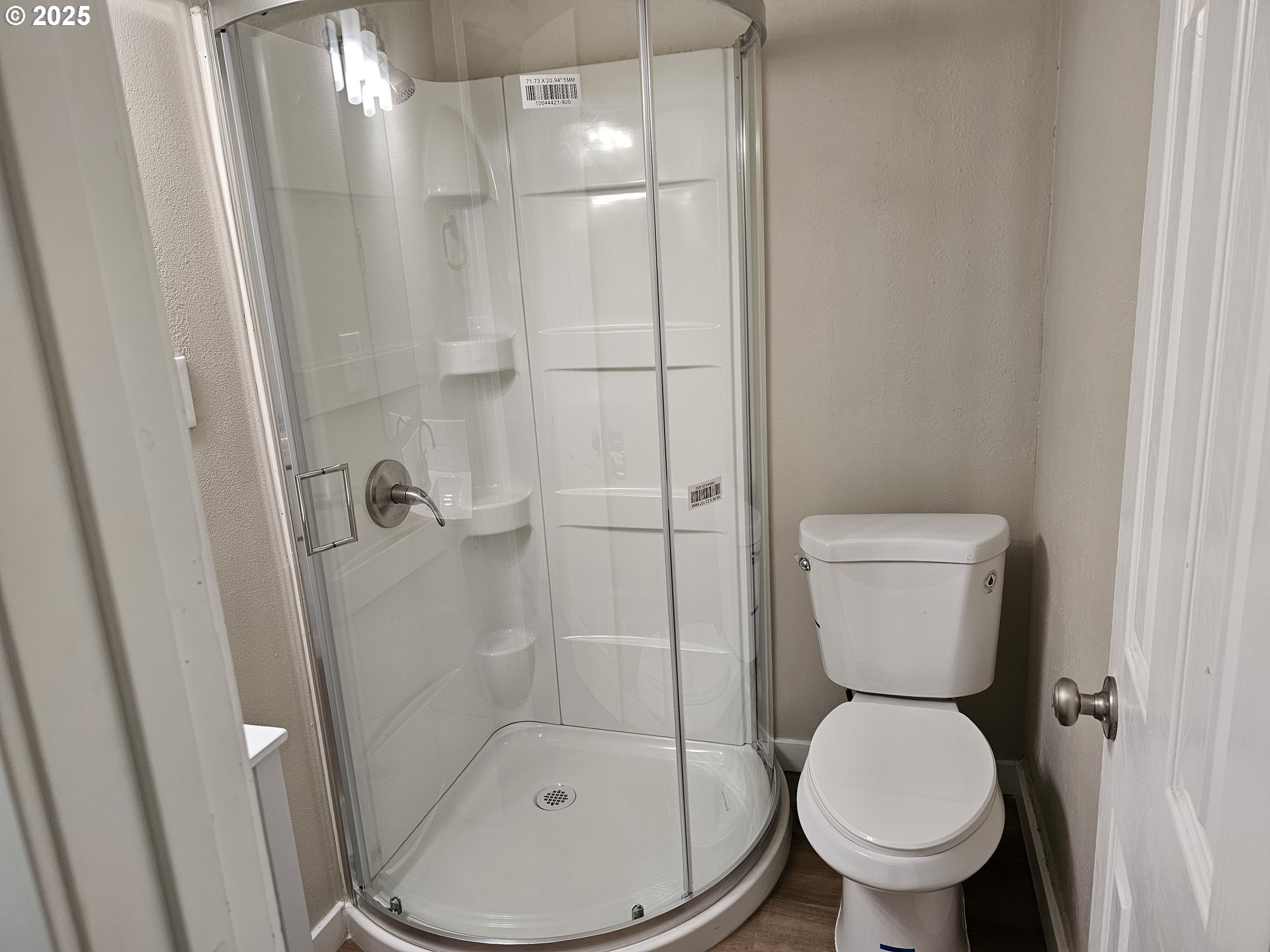 3128 Garfield Street Longview, WA 98632 - Photo 45 of 48 a bathroom with a toilet and a shower