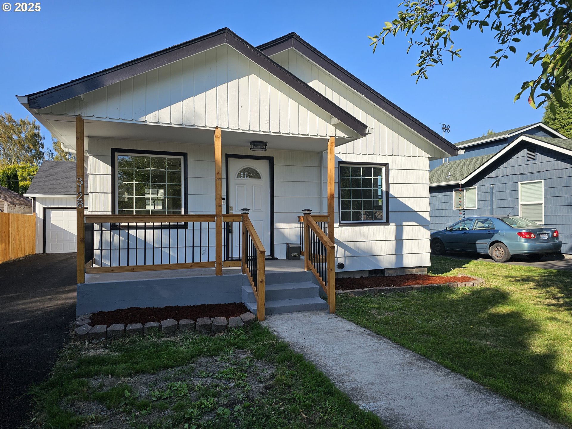 3128 Garfield Street Longview, WA 98632 - Photo 6 of 48 a front view of a house with garden