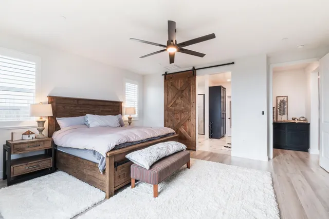 a bathroom with a double vanity sink shower and mirror