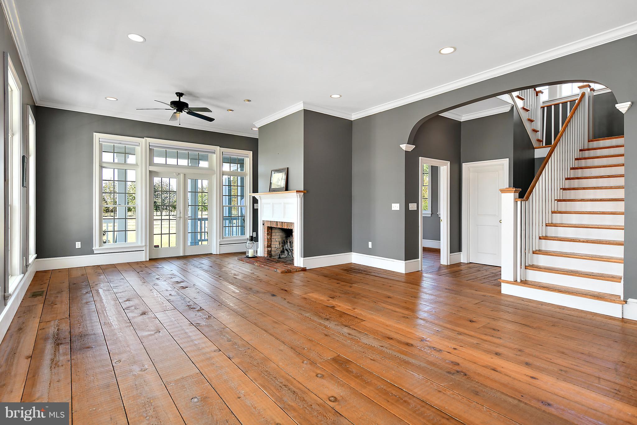 34645 Winding Road Frankford, DE 19945 - Photo 16 of 111 Family room with wide plank rustic floor boards
